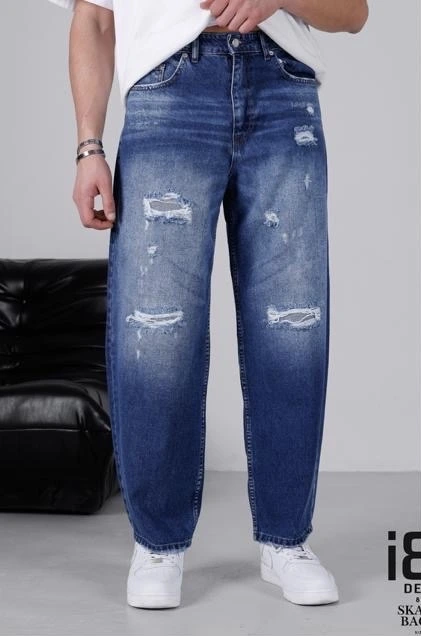 Jean baggy au délavage contrasté et aux détails usés