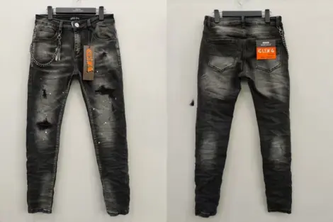 Jean Homme slim noir délavé déchirures et taches blanches.