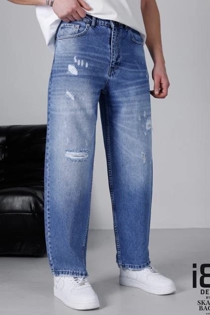 Jeans baggy bleu homme déchirures travaillées à l'avant avec effet délavé