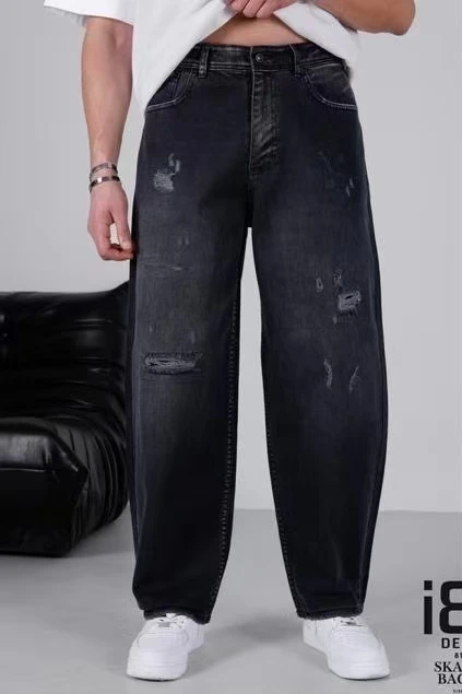 Jeans baggy noir homme déchirures travaillées à l'avant