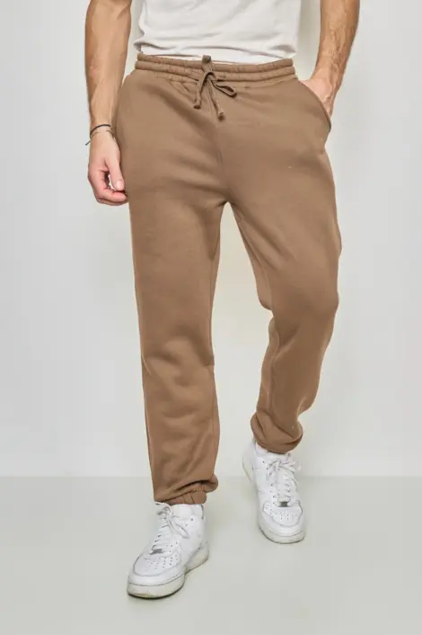 JOGGING UNI HOMME AVEC CORDON ET SERRAGE CHEVILLE