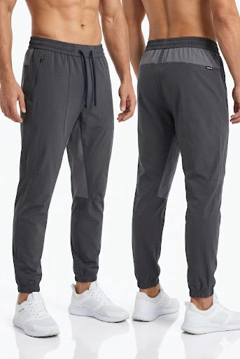 Pantalon uni homme, sport performance, alliance confort thermique et design