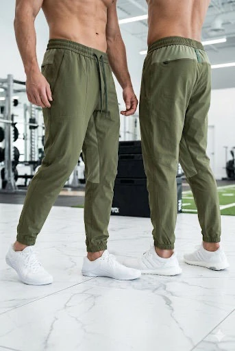 Pantalon uni homme, sport performance, alliance confort thermique et design