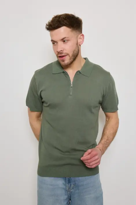 Polo homme uni à col zippé semi-transparent