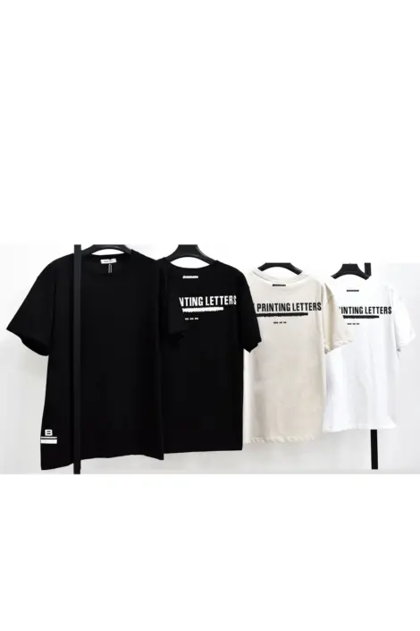 T-shirt uni col rond manches courtes motif